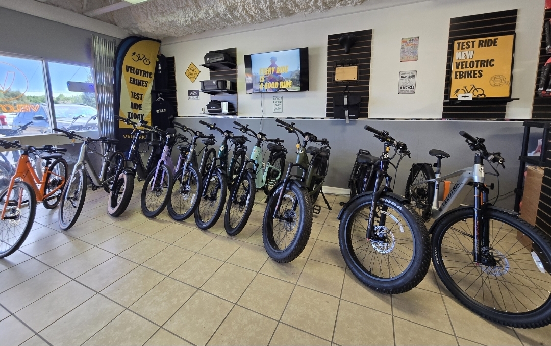 A professional technician performing maintenance on an electric bike in our Colorado Springs workshop